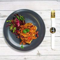 Jacket Potatoes are served with a side salad Three Fillings